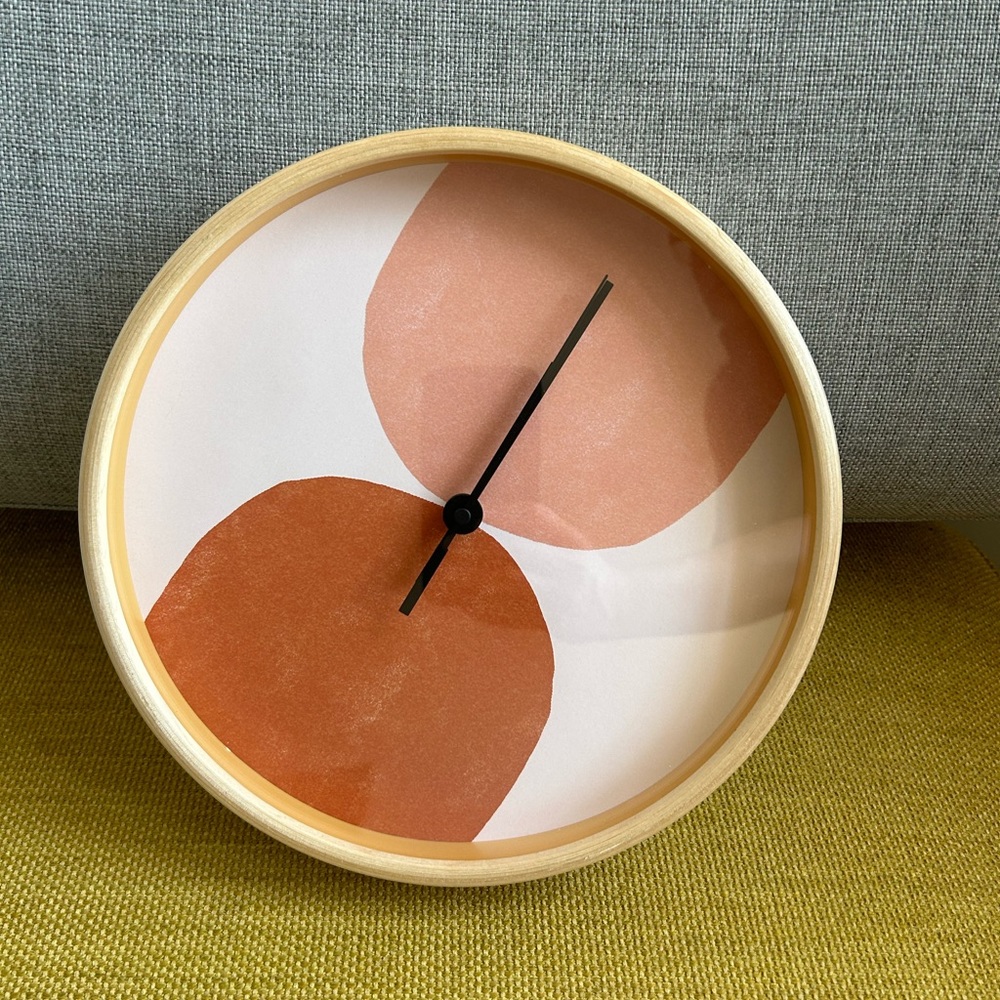 Society6 Terracotta Mid Century Modern Abstract wall clock in hand